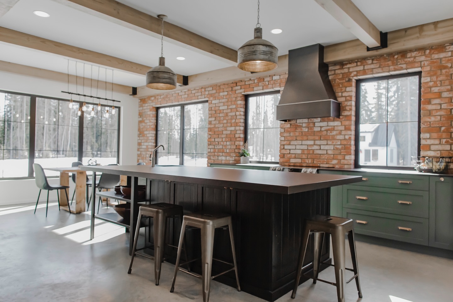 Beams in the kitchen with metal accents >
Photo and home by @stonebuilthomes