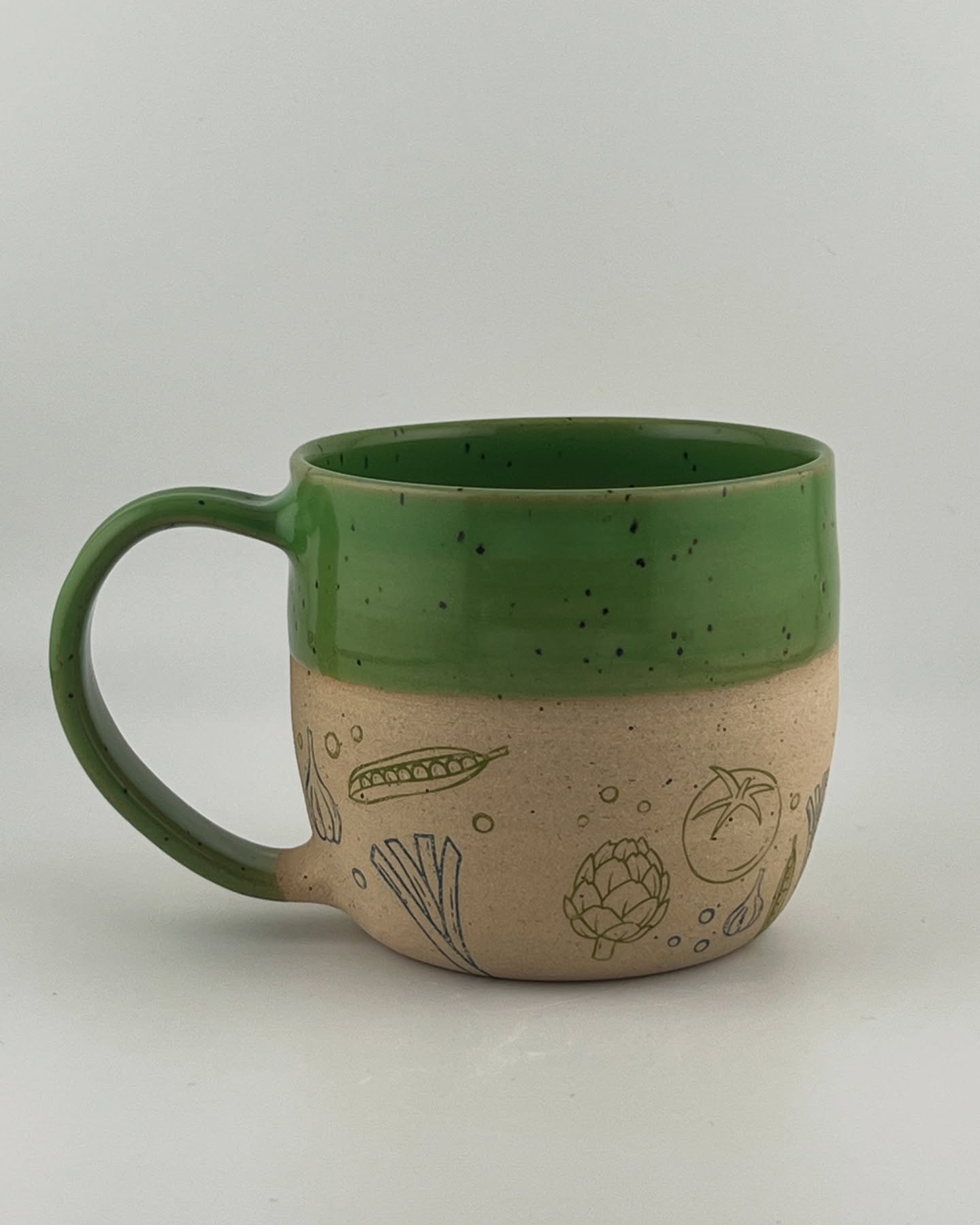 This mug has Sweet Pea glaze on Roo clay. The veggie designs are not original to me. They are underglaze decals that came from @elantransfers and are used by many potters. It’s fun and easy! They are permanent and durable. Available Saturday, June 21st at the @newalbanyfarmersmarket 8-12