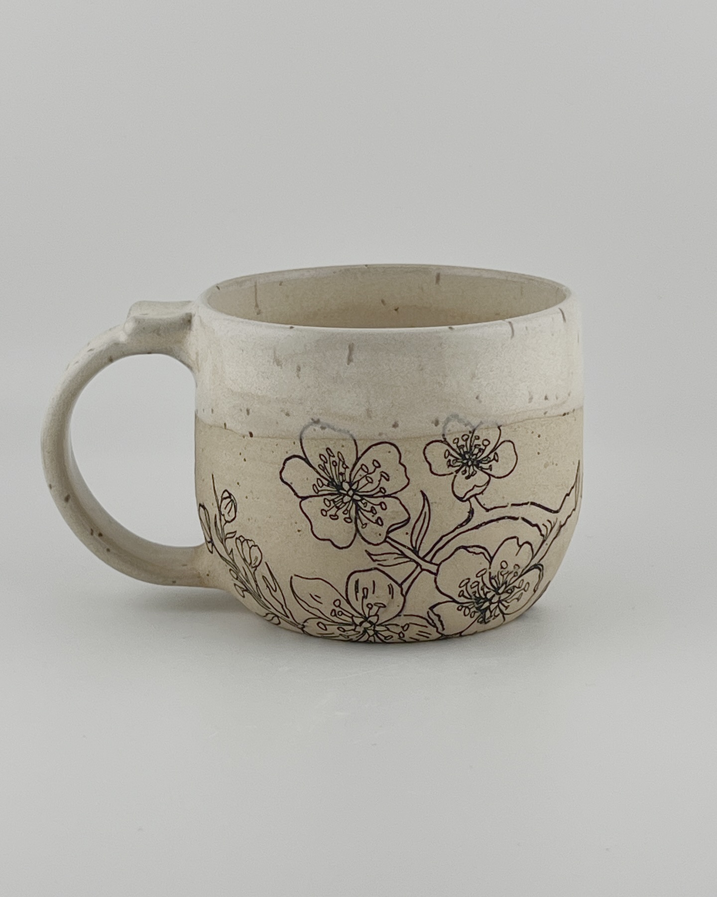 This mug has Cosmos glaze on Roo clay. The transfers are from @elantransfers and are not my original artwork but they are adorable. Available June 21st, at the @newalbanyfarmersmarket 8-12